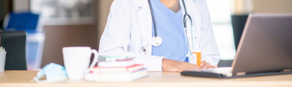 doctor sitting at desk